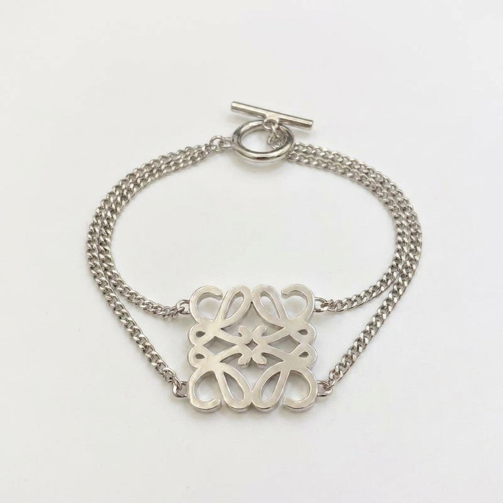 Loewe Anagram Silver Metal Bracelet featuring the iconic openwork logo in a polished finish