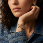 Model wearing Loewe Anagram Geometric Earrings, a chic modern accessory for daily luxury