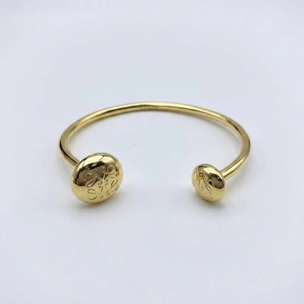 LOEWE gold Anagram Bracelet featuring the iconic openwork logo in a polished silver finish