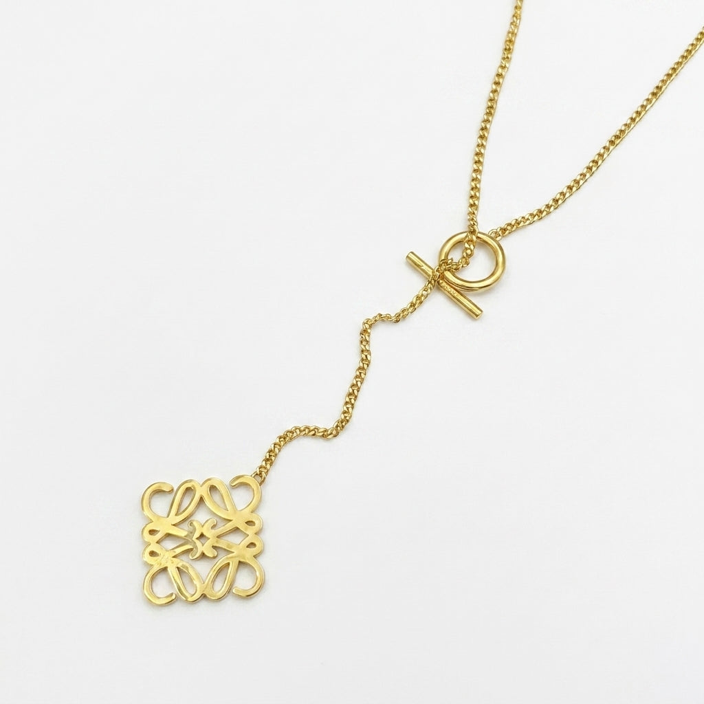 LOEWE gold Anagram OT Pendant Necklace with toggle clasp and openwork logo charm