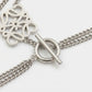 Detailed shot of the secure clasp and the discreet Loewe logo hallmark on the silver bracelet