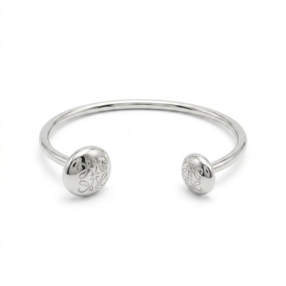 LOEWE Silver Anagram Bracelet featuring the iconic openwork logo in a polished silver finish