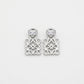 Loewe Silver Anagram Cutout Earrings with pavé crystals in a polished sterling silver finish