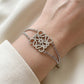 Model wearing Loewe Silver Anagram Bracelet, a bold and minimalist accessory for modern luxury