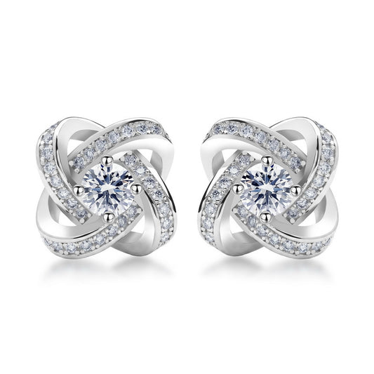 Love knot round cut lab grown diamond pavé halo stud earrings in 925 sterling silver.