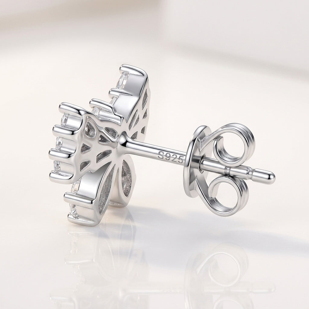 Micro profile view showing the sterling silver under-gallery, S925 hallmark, and push back post of luxury moissanite bow studs.