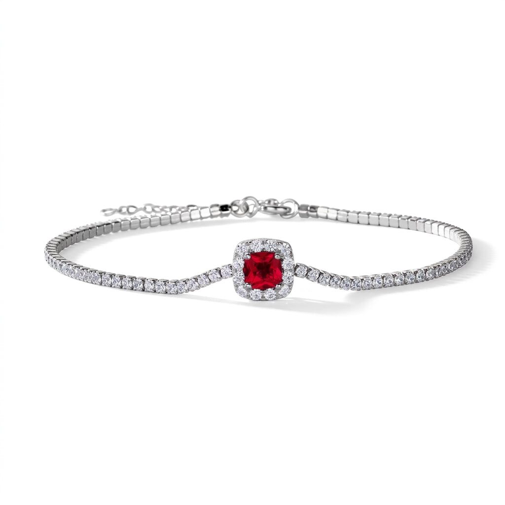 Flat lay studio product shot of a luxury cushion-cut lab-grown ruby tennis bracelet with a micro-pave halo.