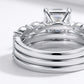 Micro profile view showing the sterling silver bands, S925 hallmark, and precise prongs of luxury emerald cut moissanite stackable rings.