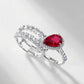 Side view of a premium luxury pear-cut ruby 2-piece stacking ring combo showcasing precise prong artistry.