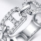 Micro profile close-up on the pave moissanite mariner links, interlocking silver joins, and mirror-polished surface finish.