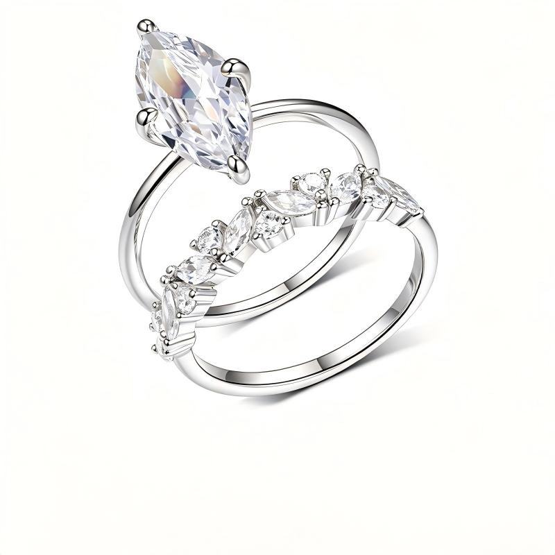 Marquise cut moissanite solitaire and crown stacking ring set in platinum plated silver.