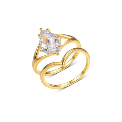 Marquise cut moissanite solitaire and wishbone chevron stacking ring set in 18K gold plated silver.