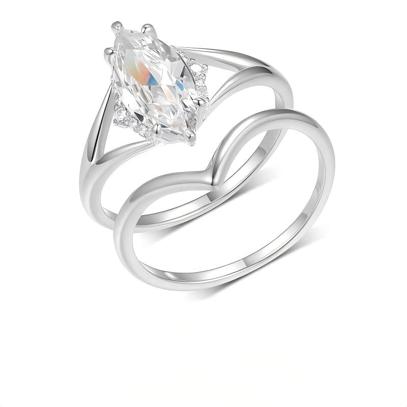 Marquise cut moissanite solitaire and wishbone chevron stacking ring set in platinum plated silver.