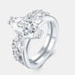 Side profile view showing interlocking 2-piece marquise moissanite bridal ring set.