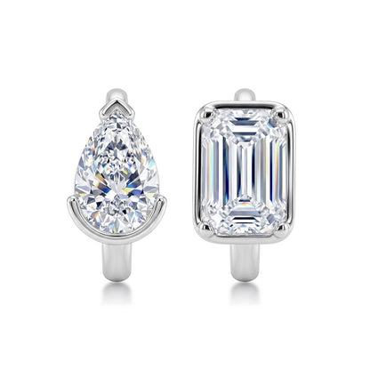 Mismatched pear and emerald cut lab grown diamond bezel huggie hoop earrings in 925 sterling silver.