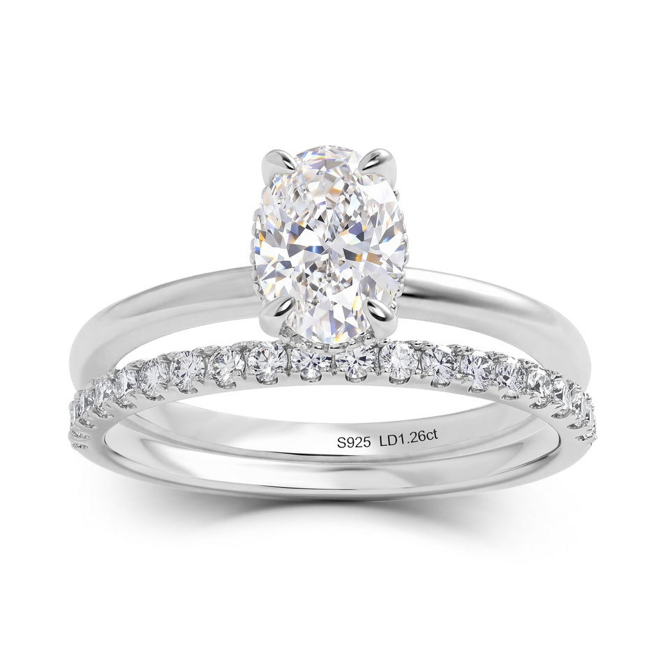 Modern 1.26ct oval cut lab diamond stacking bridal wedding ring set in 925 sterling silver.
