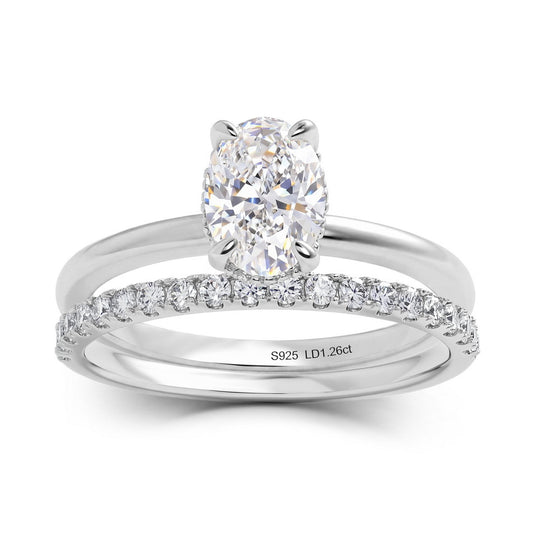 Modern 1.26ct oval cut lab diamond stacking bridal wedding ring set in 925 sterling silver.