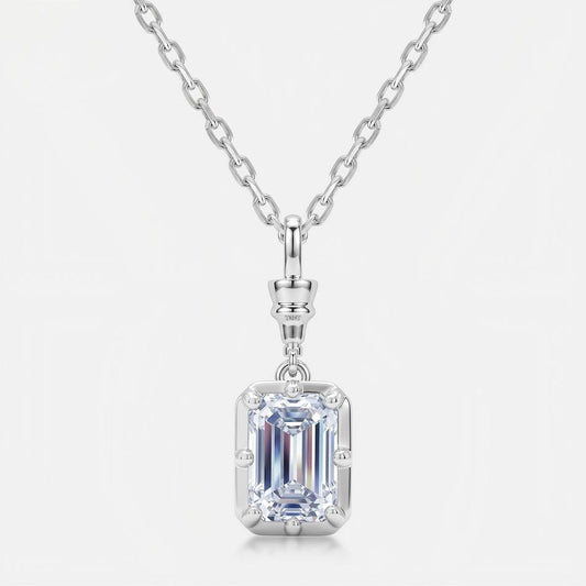 Modern geometric emerald cut lab diamond bezel solitaire pendant necklace in 925 sterling silver.