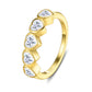 Profile angle studio perspective of a modern geometric multi heart bezel stacking ring highlighting the polished metal finish.