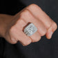 Model wearing S925 sterling silver iced out moissanite baguette square signet ring on finger