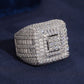 Model wearing S925 sterling silver iced out moissanite baguette square signet ring on finger