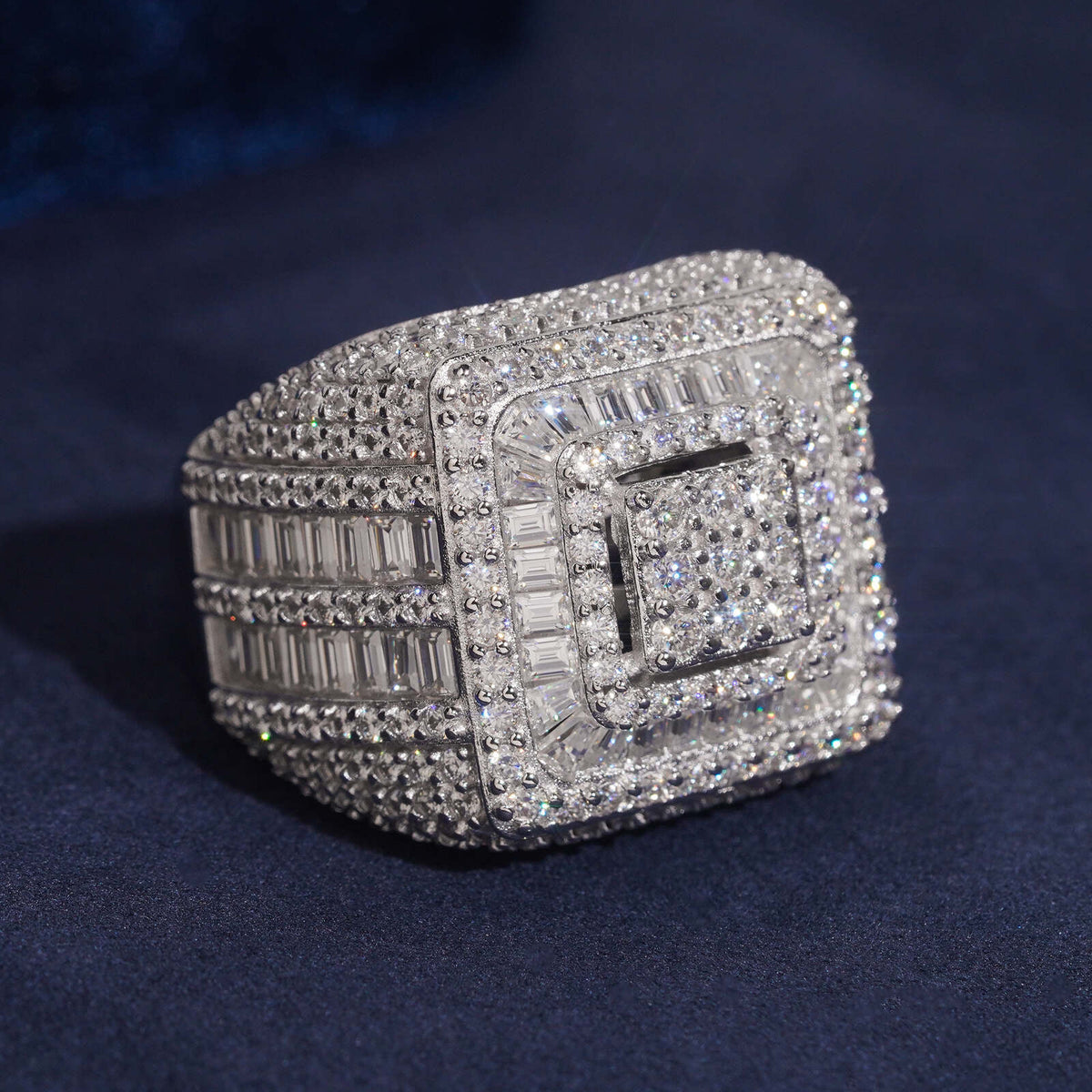 Model wearing S925 sterling silver iced out moissanite baguette square signet ring on finger