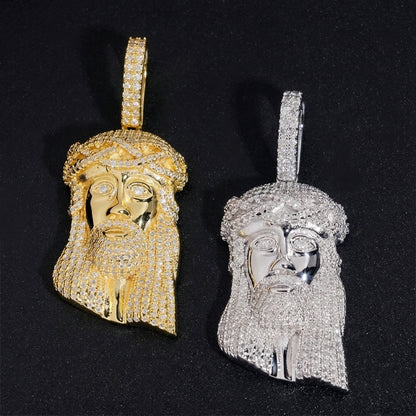 Gold and silver S925 sterling silver iced out moissanite classic Jesus piece pendants on dark background