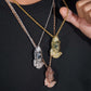Model wearing layered S925 silver iced out moissanite praying hands pendant necklaces