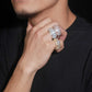Model wearing layered S925 sterling silver iced out round baguette moissanite 3-row band rings on fingers