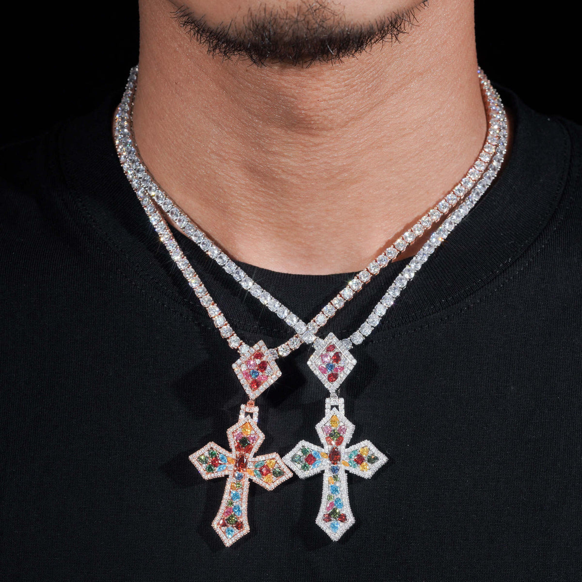 Model wearing layered S925 silver multi-color moissanite cross pendant necklaces with tennis chains