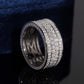 Angled view showing inner hollow pattern of multi row micro pave moissanite wide ring