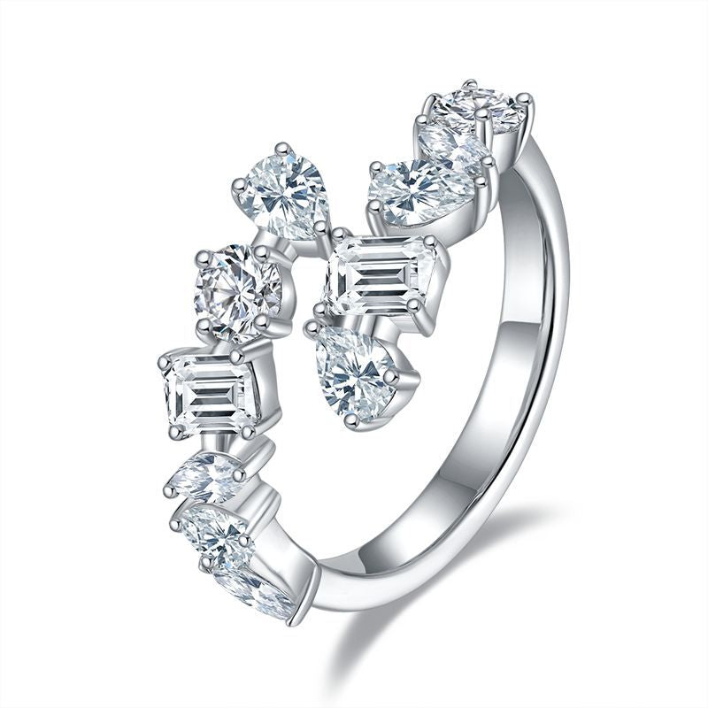 Multi-shape moissanite open bypass ring featuring mixed cut cluster on white background.