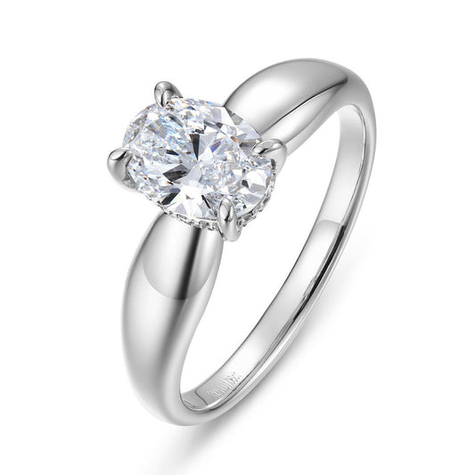 Angled view of oval diamond solitaire ring showing thick tapered band profile and 4-prong setting.