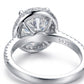Macro close-up showing basket undergallery and S925 hallmark on silver oval moissanite halo ring.