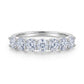 Front view of oval seven-stone shared-prong stacking band ring.