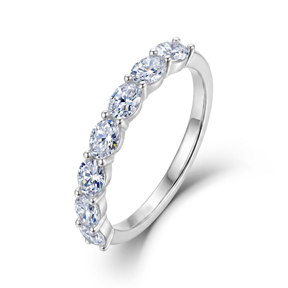 Oval seven-stone shared-prong stacking band ring in 925 silver.