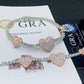 Pave heart moissanite tennis bracelets with rose gold pave heart links and GRA report