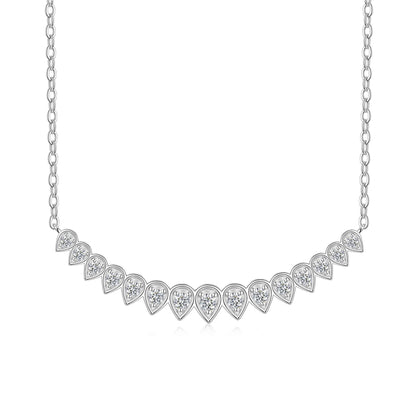 Pear cut bezel set moissanite curved smile necklace in sterling silver.