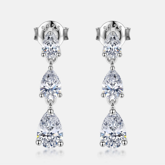 Pear cut lab grown diamond 3-stone graduated linear dangle earrings in 925 silver.
