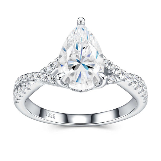 Front view of pear-cut moissanite ring showing brilliant sparkle and intricate stone setting