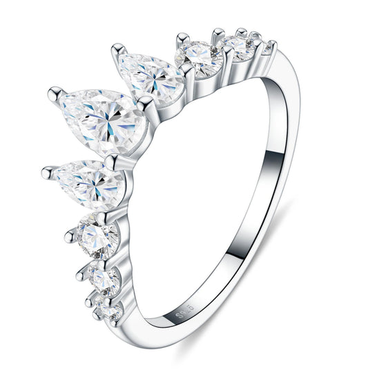 Silver pear cut moissanite tiara crown curved stacking ring showing S925 hallmark on white background.