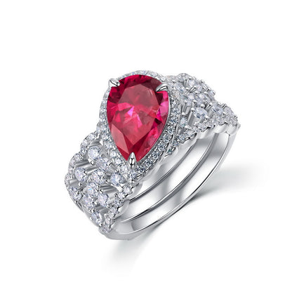 Luxury 2-piece pear-cut ruby stackable ring set in 925 sterling silver with a brilliant pave band.