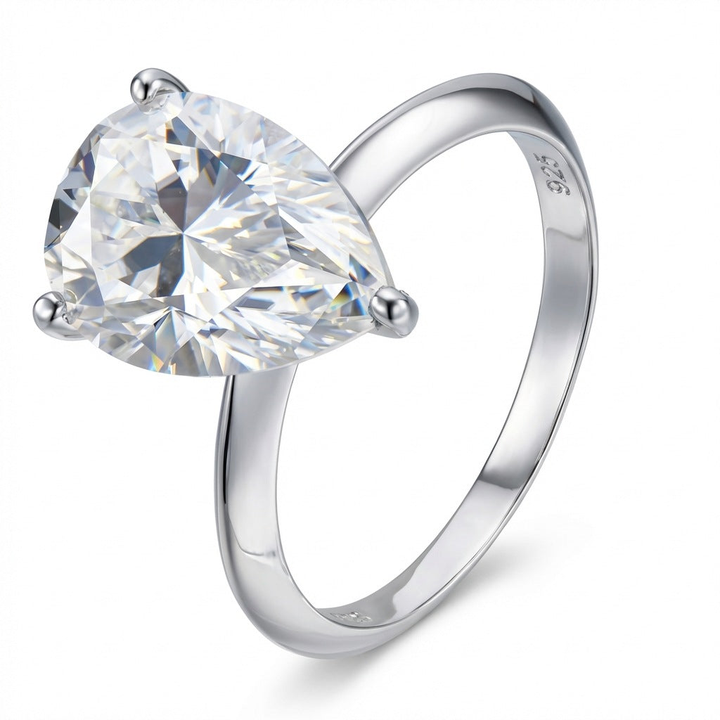 Pear cut moissanite horizontal teardrop east-west solitaire ring in 925 sterling silver.