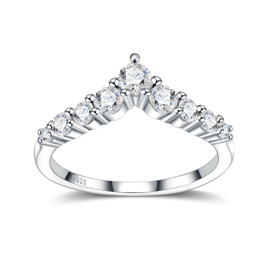 Symmetrical studio display of a platinum plated chevron moissanite v shaped crown ring with graduated side stones.