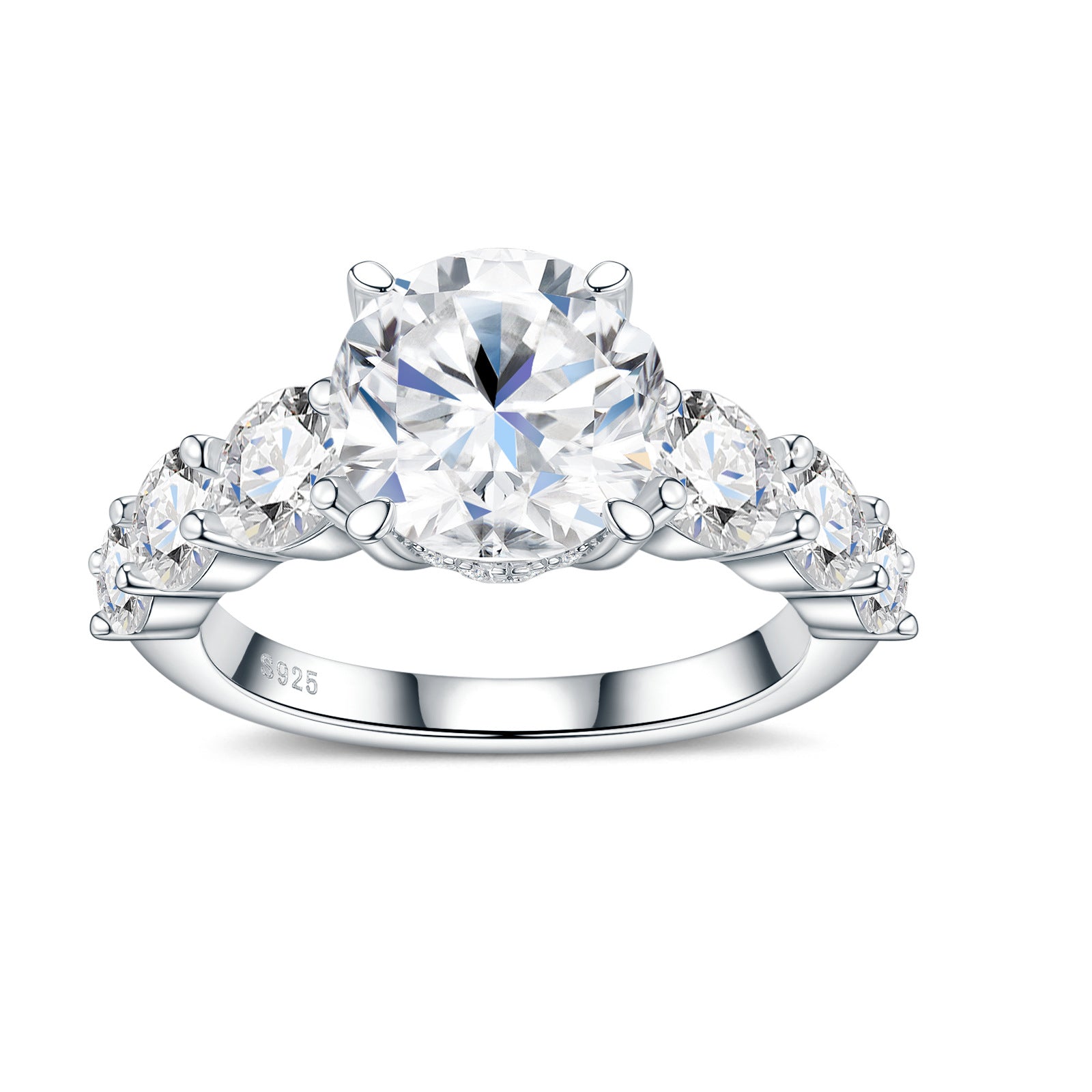 Frontal studio catalog shot of a platinum plated round cut moissanite solitaire statement ring with graduated side stones.