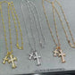 “Gold and silver double cross necklace flat lay showing zircon pendant and link chain”