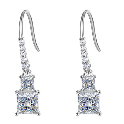Pair of princess cut two-stone dangle drop earrings with pavé line French wire in 925 silver.