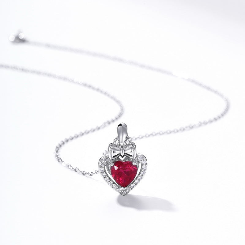 heart-shaped-ruby-ribbon-pendant-side-view