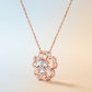 Close-up shot of rose gold openwork clover pendant with sparkling moissanite stones.