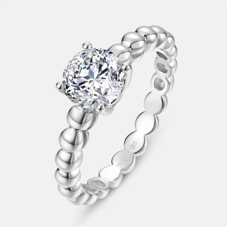 Round brilliant cut bubble band solitaire engagement ring in 925 sterling silver.